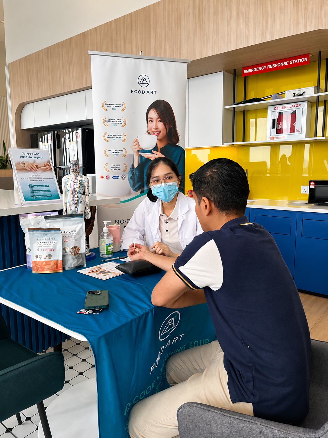 Food Art booth at the Allianz Health Festival — free TCM pulse diagnosis
